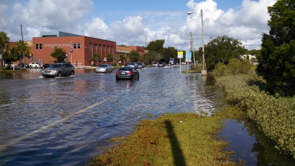 Cars travel through high water Charleston, South Carolina